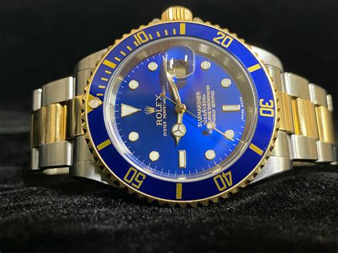 rolex submariner gold with blue dial|Rolex gold submariner blue face.